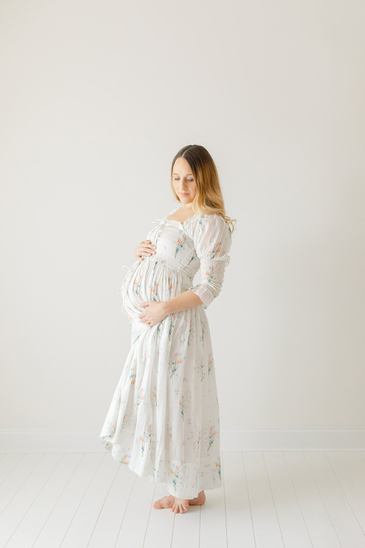 image of stunning mother expecting her second baby in maternity photography studio in birmingham AL