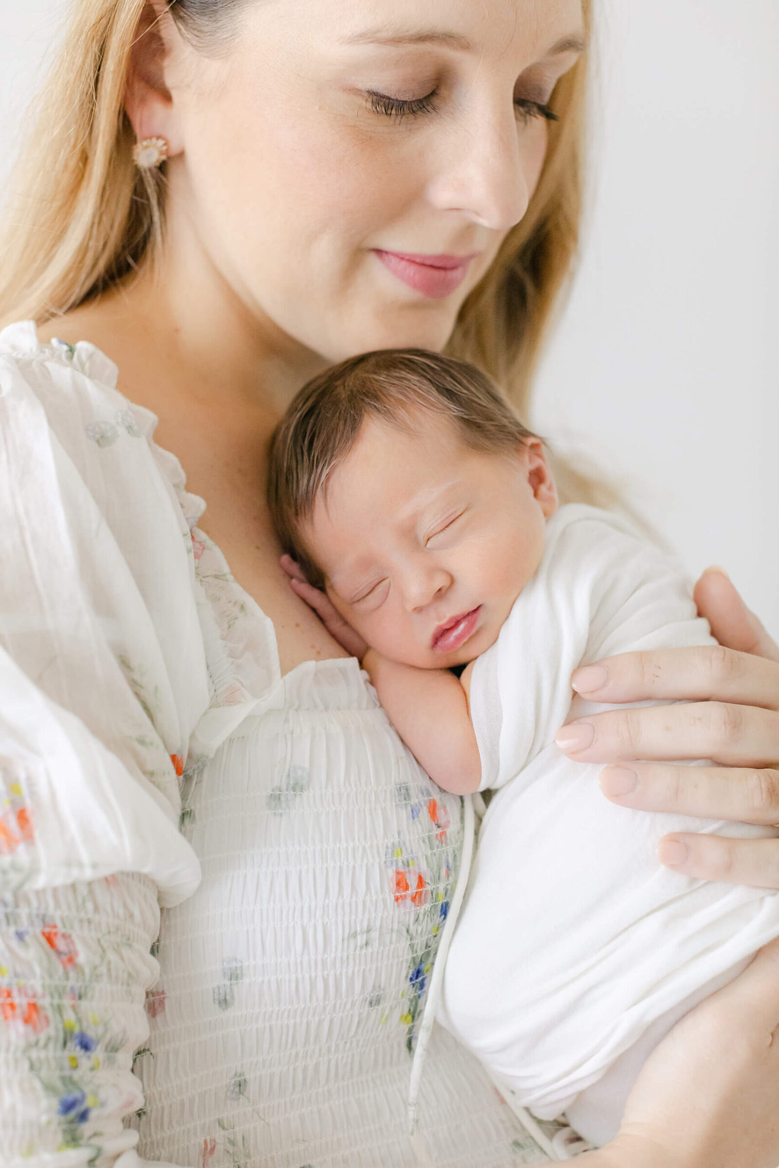 light filled newborn photography in birmingham AL with mom and baby