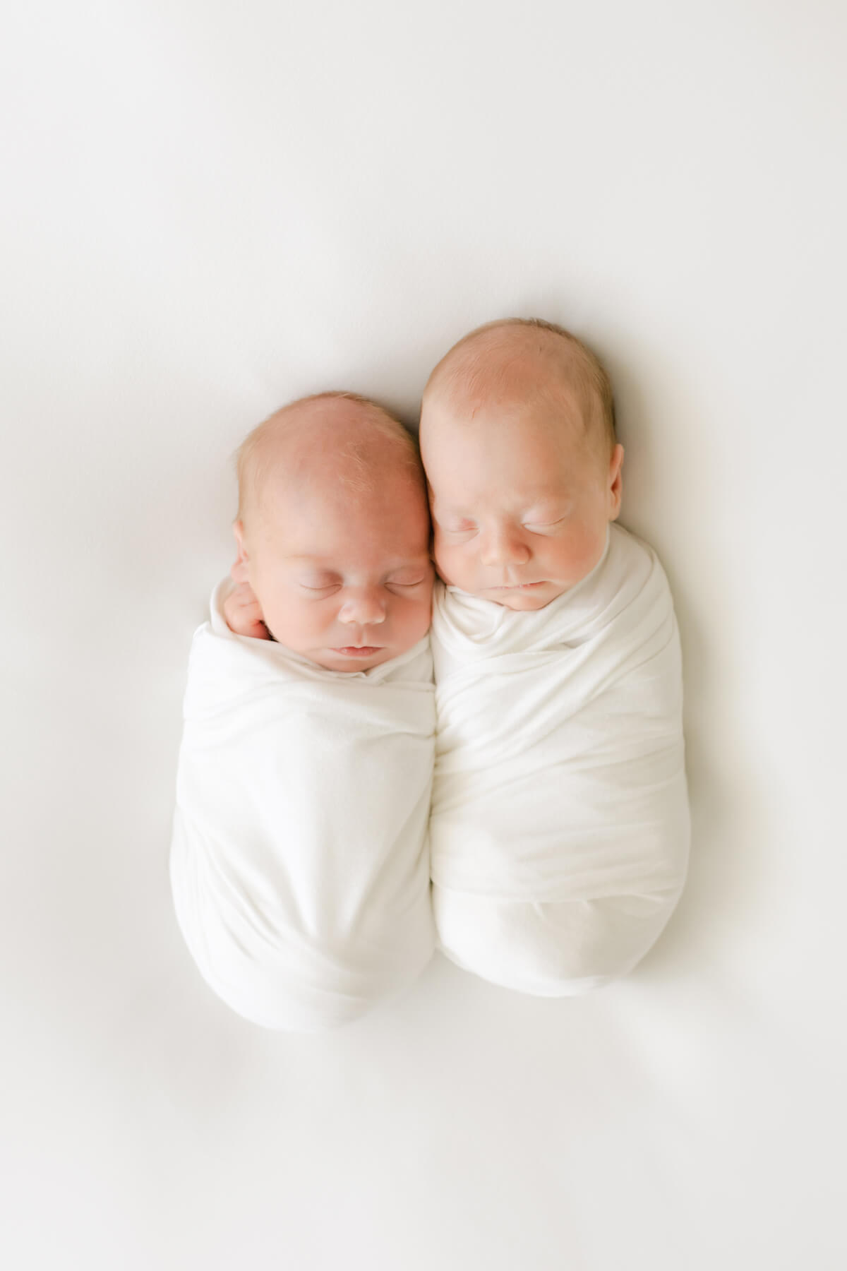 newborn twin photography session featuring fraternal twins in Omaha