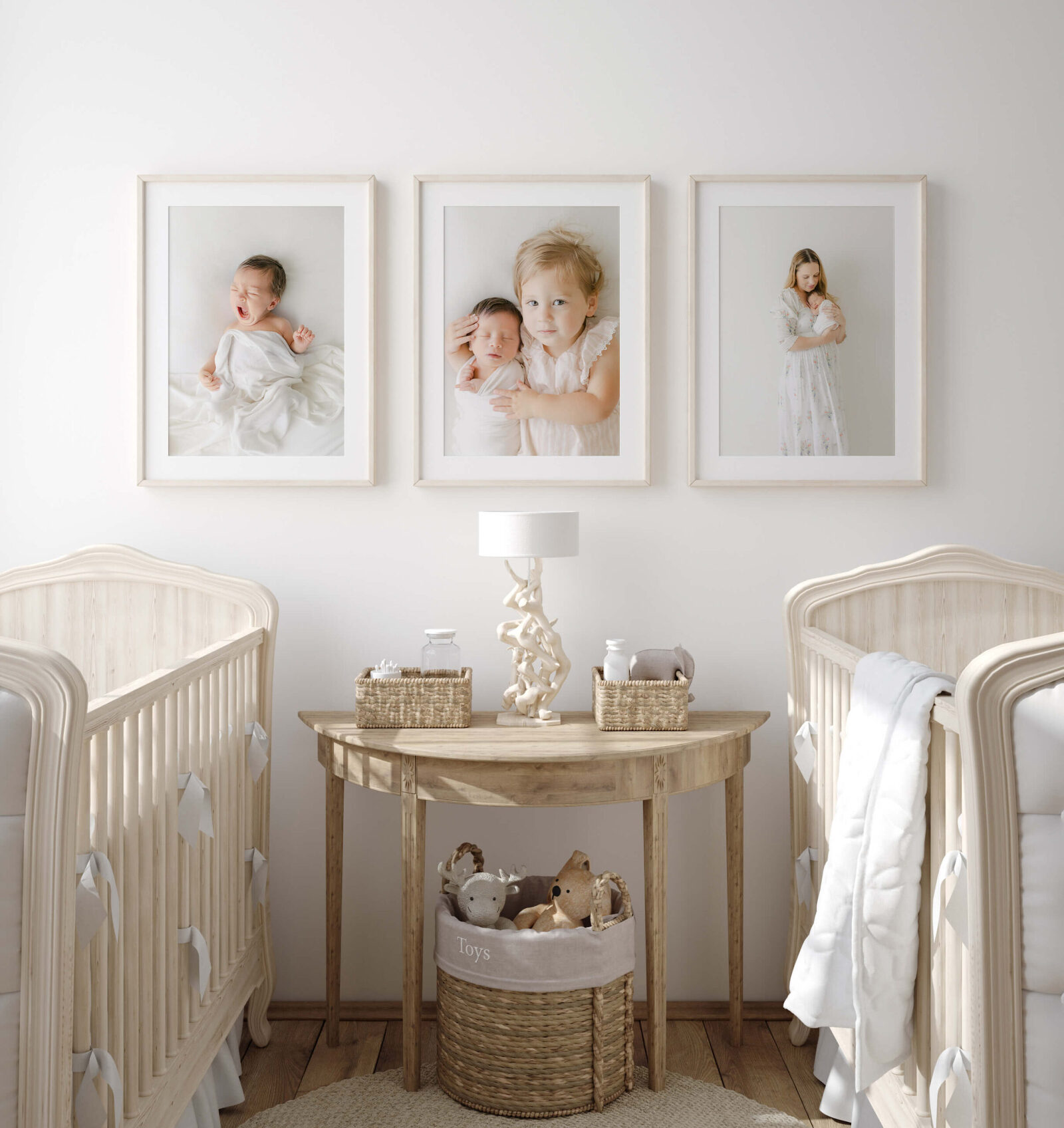 gorgeous light filled nursery featuring three adorable photographs with newborn and big sister